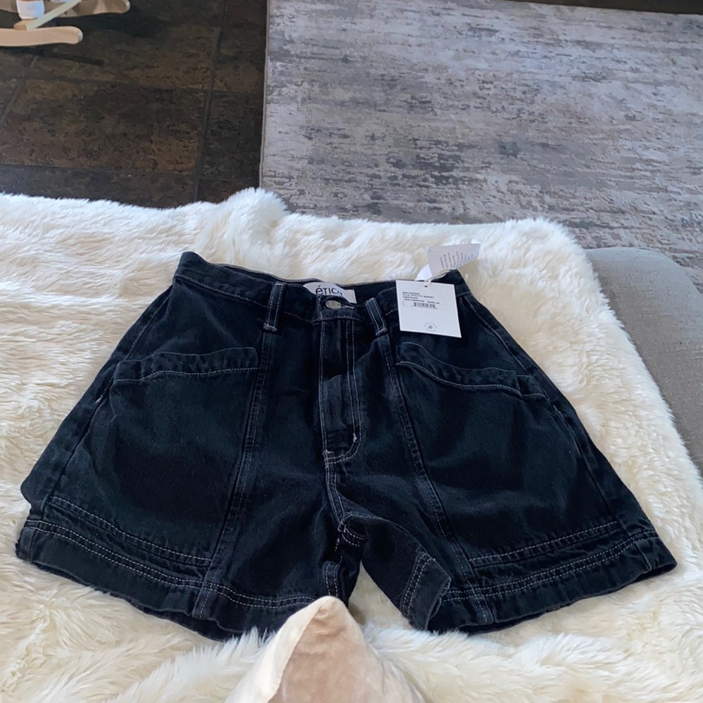 Brand new chic, relaxed fit short, utility pocketing and contrast seaming.